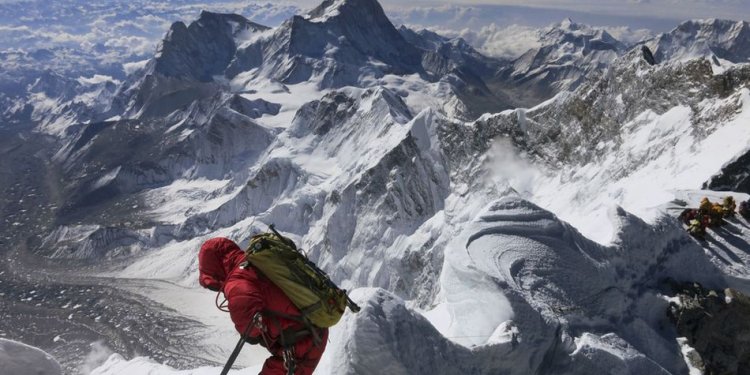 A climber prepares to descend