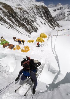 All About Mount Everest Fun Facts for children - picture of a Man Climbing the Mount Everest